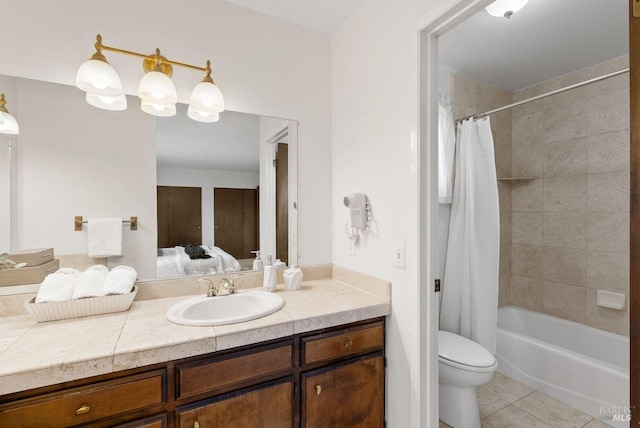 ensuite bathroom featuring vanity, toilet, tile patterned floors, shower / bath combination with curtain, and ensuite bathroom