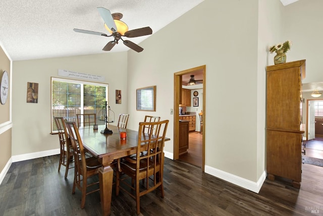 dining area with baseboards, ceiling fan, dark wood-style flooring, and high vaulted ceiling