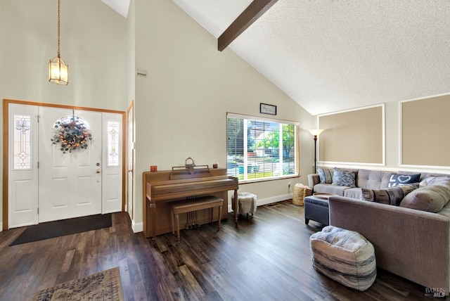 foyer entrance featuring beam ceiling, a textured ceiling, high vaulted ceiling, baseboards, and dark wood-style floors