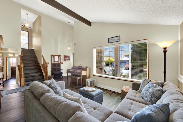living area with beam ceiling, baseboards, high vaulted ceiling, dark wood-style floors, and stairs