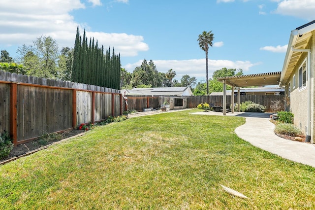 view of yard with a fenced backyard, a pergola, and a patio area