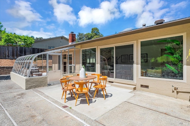 view of patio with fence