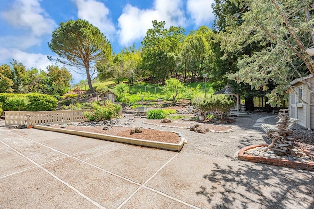 view of patio / terrace with fence