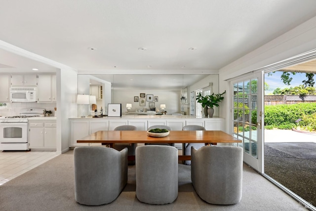 dining space featuring recessed lighting