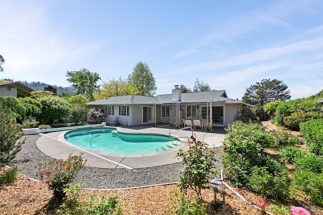 outdoor pool with a patio