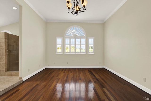 unfurnished dining area with an inviting chandelier, baseboards, crown molding, and hardwood / wood-style floors