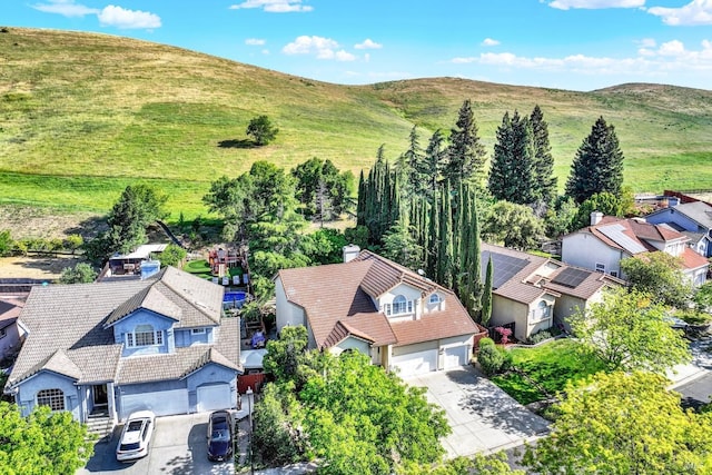 aerial view featuring a residential view and a mountain view