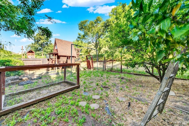 view of yard featuring fence