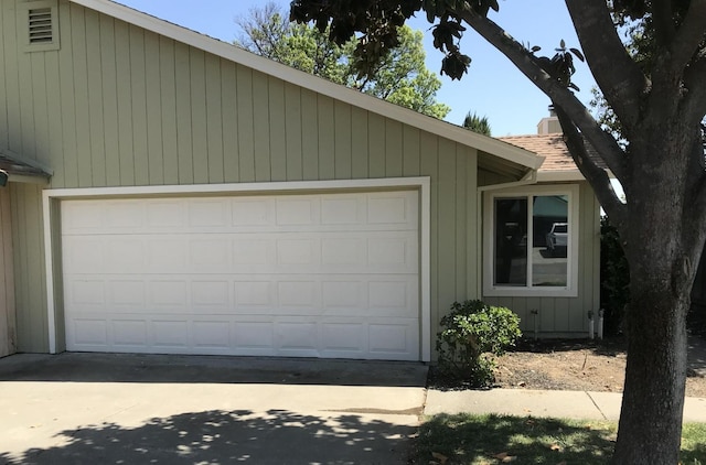 garage featuring driveway