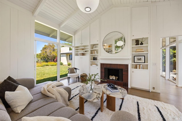 sunroom with beamed ceiling