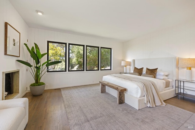bedroom with wood finished floors