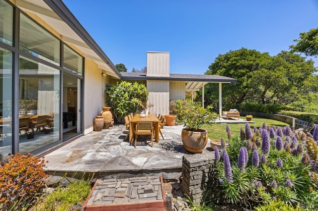 view of patio featuring outdoor dining space