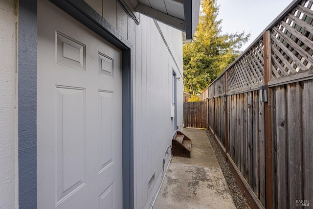 view of home's exterior featuring fence