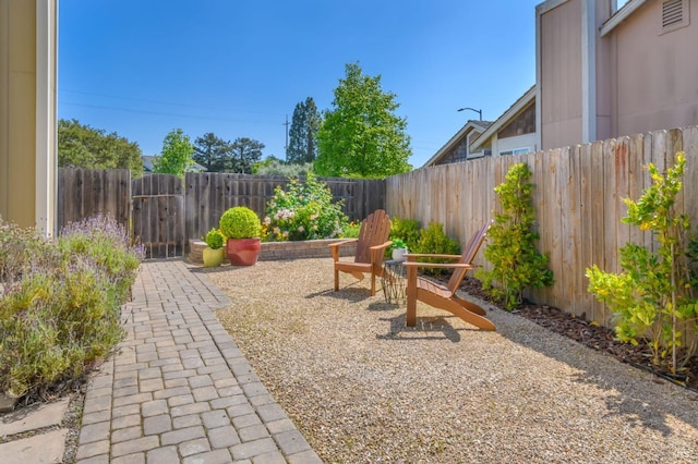 view of play area with a fenced backyard