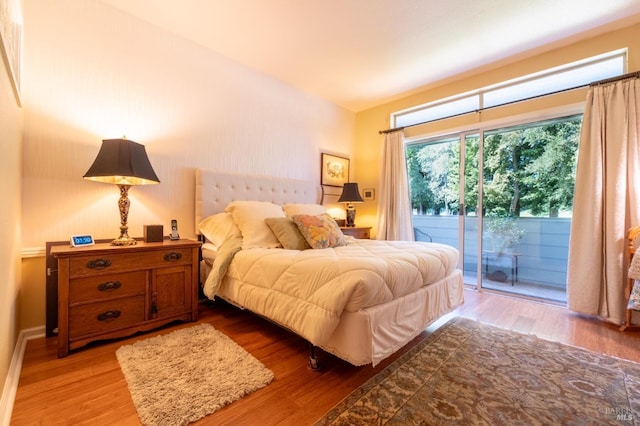 2066 Stonefield Ln, Santa Rosa, CA 95403 - bedroom featuring access to exterior and wood finished floors