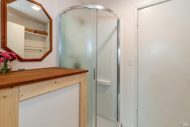 bathroom with a stall shower