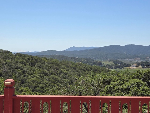 mountain view featuring a forest view
