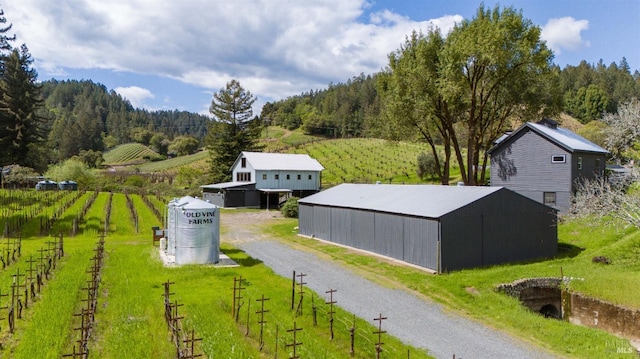 aerial view with a view of trees and a rural view