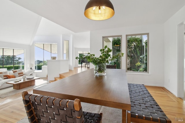 dining area with light wood-style floors