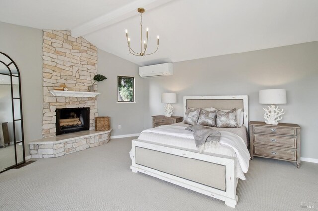 carpeted bedroom with a notable chandelier, a stone fireplace, baseboards, vaulted ceiling with beams, and a wall mounted AC