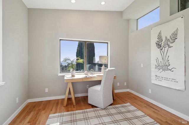 office area featuring recessed lighting, baseboards, and wood finished floors