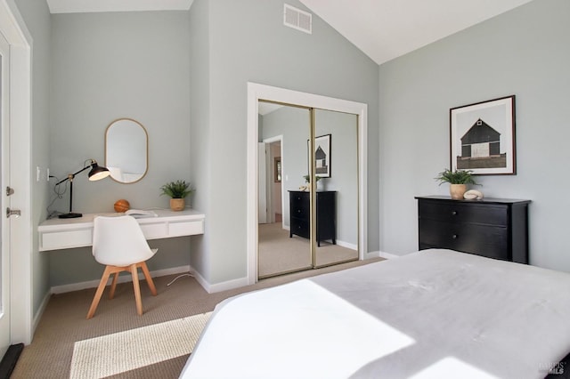 bedroom with visible vents, baseboards, lofted ceiling, and carpet