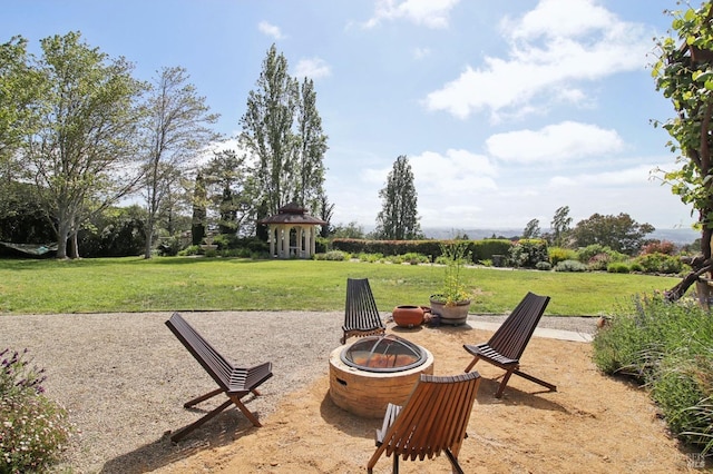 view of patio featuring a fire pit