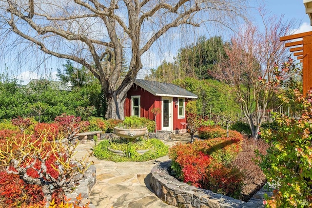 view of outbuilding featuring an outdoor structure