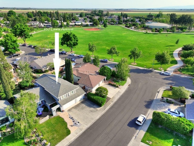 birds eye view of property with a residential view