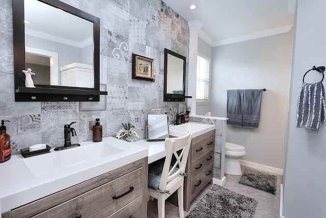 full bath featuring vanity, ornamental molding, toilet, baseboards, and tile patterned floors