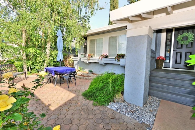 view of patio with outdoor dining area