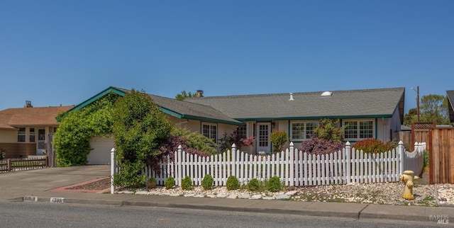 1305 Lombardi Ave, Petaluma, CA 94954 - single story home with a garage, driveway, and a fenced front yard