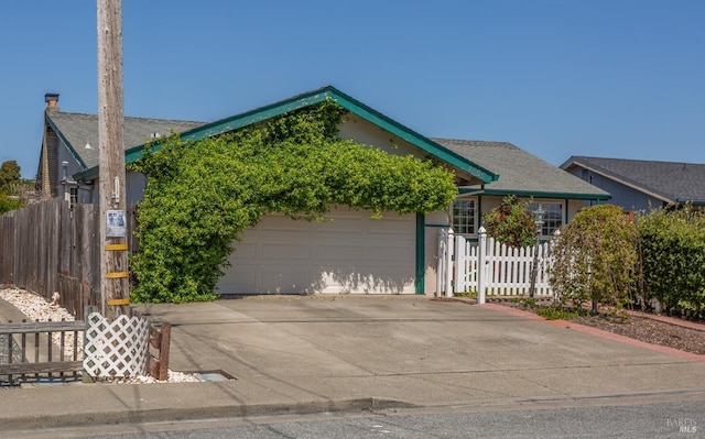 1305 Lombardi Ave, Petaluma, CA 94954 - view of front of property with a garage and concrete driveway