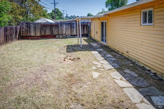 view of yard featuring a fenced backyard