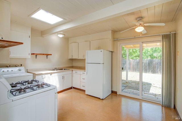 kitchen with open shelves, a sink, white appliances, light countertops, and beamed ceiling