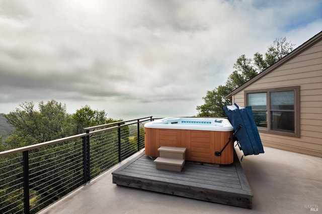 view of patio / terrace featuring a hot tub