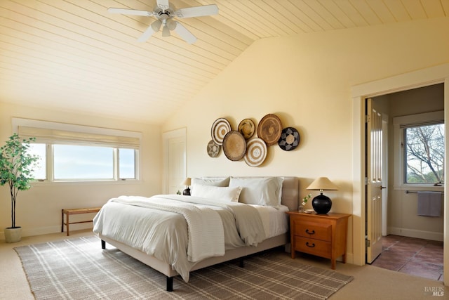 bedroom featuring wooden ceiling, baseboards, multiple windows, and lofted ceiling