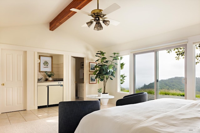 bedroom with a ceiling fan, access to outside, light tile patterned floors, vaulted ceiling with beams, and ensuite bath