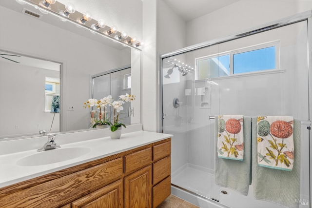 943 Bridgeport Way, Rio Vista, CA 94571 - bathroom featuring vanity, tile patterned flooring, a shower stall, and visible vents