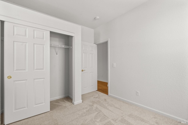 943 Bridgeport Way, Rio Vista, CA 94571 - unfurnished bedroom featuring a closet, baseboards, and carpet flooring