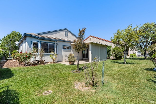 943 Bridgeport Way, Rio Vista, CA 94571 - view of front of home with a patio area, a front yard, and stucco siding