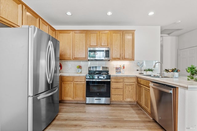 943 Bridgeport Way, Rio Vista, CA 94571 - kitchen with a sink, decorative backsplash, stainless steel appliances, and tile countertops