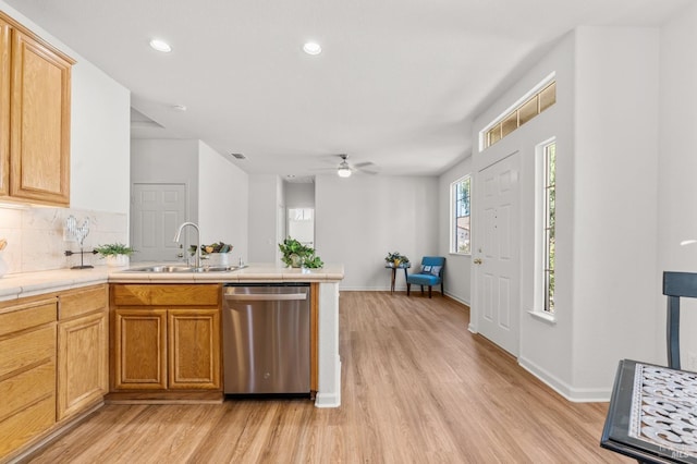 943 Bridgeport Way, Rio Vista, CA 94571 - kitchen with light wood-style floors, a sink, and dishwasher