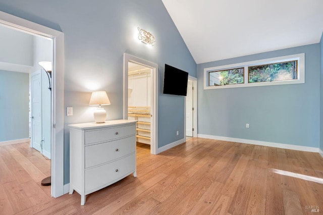 269 Corte Madera Ave, Mill Valley, CA 94941 - bedroom with light wood-style floors, baseboards, lofted ceiling, and ensuite bathroom