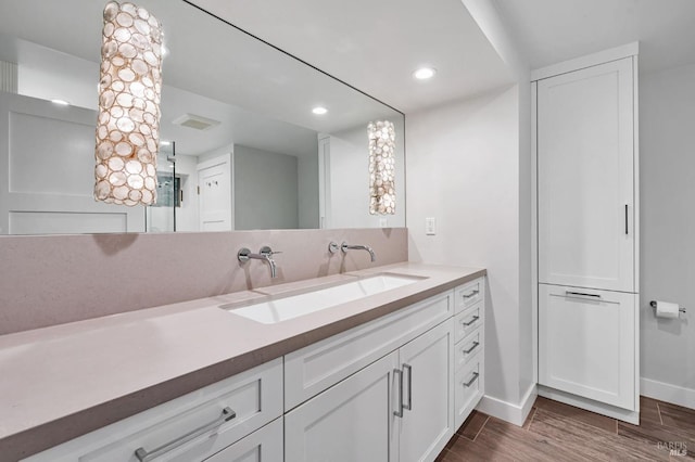 269 Corte Madera Ave, Mill Valley, CA 94941 - bathroom with baseboards, wood finished floors, vanity, and recessed lighting