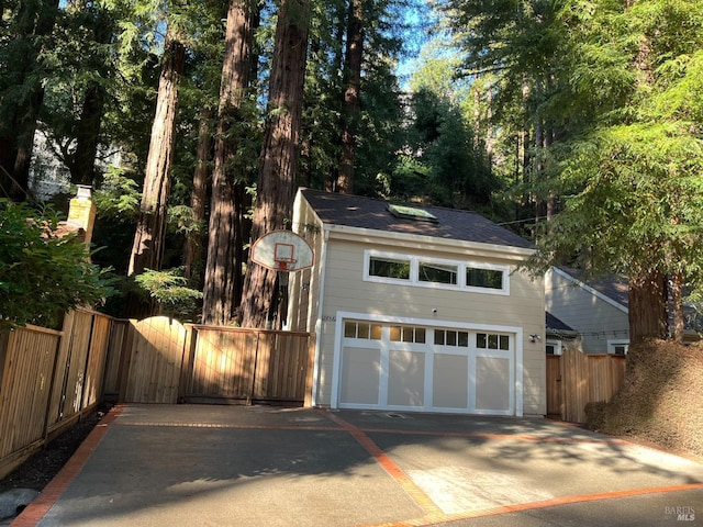 269 Corte Madera Ave, Mill Valley, CA 94941 - garage featuring asphalt driveway and fence