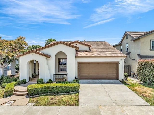 59 Toscana Dr, American Canyon, CA 94503 - mediterranean / spanish home featuring a tiled roof, a garage, driveway, and stucco siding