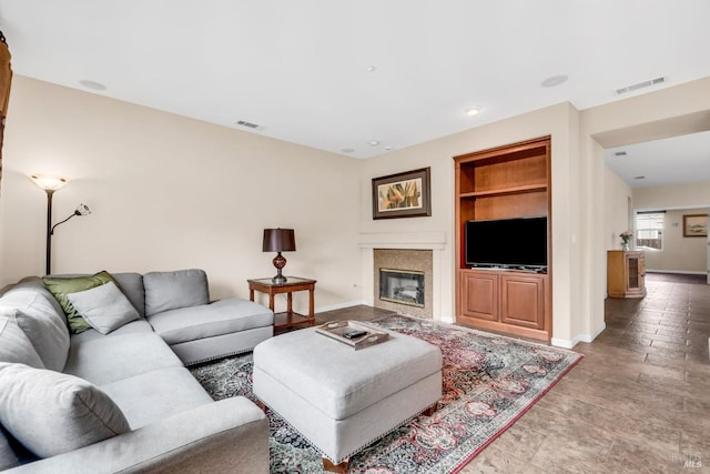 59 Toscana Dr, American Canyon, CA 94503 - living room with built in features, baseboards, and a high end fireplace