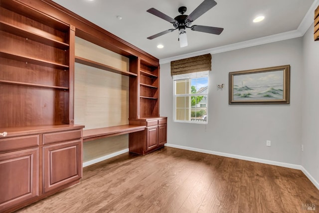59 Toscana Dr, American Canyon, CA 94503 - unfurnished office featuring built in desk, ornamental molding, baseboards, light wood-style floors, and a ceiling fan