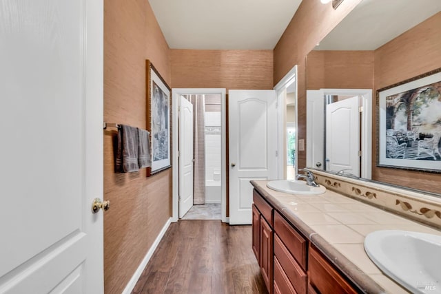 59 Toscana Dr, American Canyon, CA 94503 - full bath featuring wood finished floors, double vanity, and baseboards